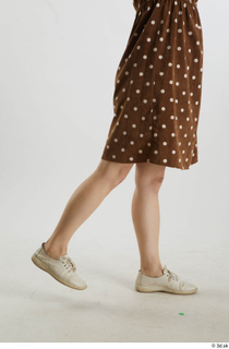 Aera  1 brown dots dress casual dressed flexing leg…